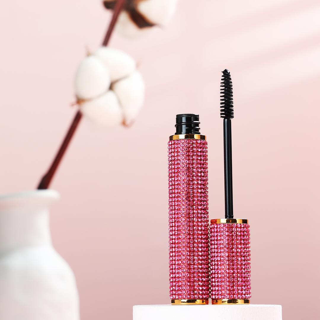 Volume Mega Mascara tube showcasing its sleek design and soft brush for bold lash application.