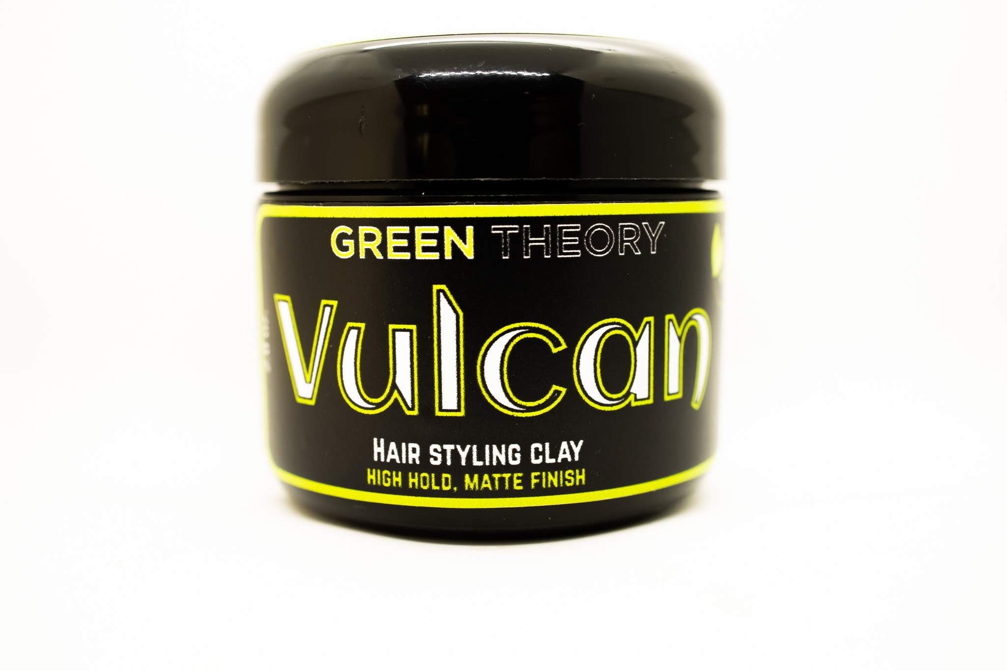 Vulcan Natural Hair Styling Clay in a stylish container, showcasing its natural ingredients and texture.