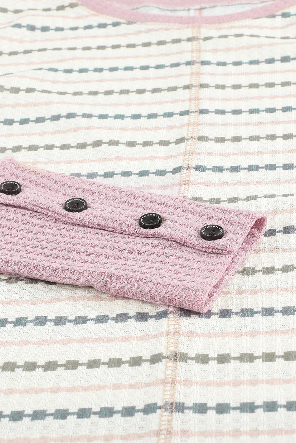 Waffle Knit Colorblock Buttoned Cuff Long Sleeve Blouse featuring a soft texture, stylish colorblock design, and buttoned cuffs.