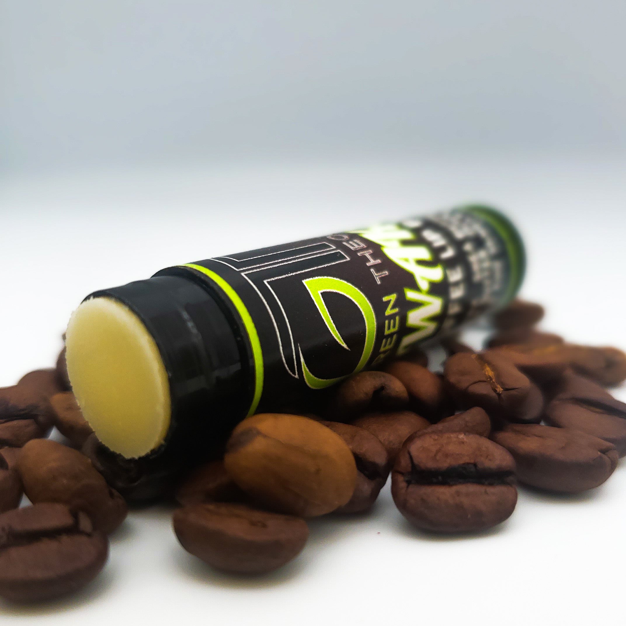 Wake All Natural Coffee and Vanilla Lip Balm in a sleek tube, showcasing its natural ingredients and inviting aroma.