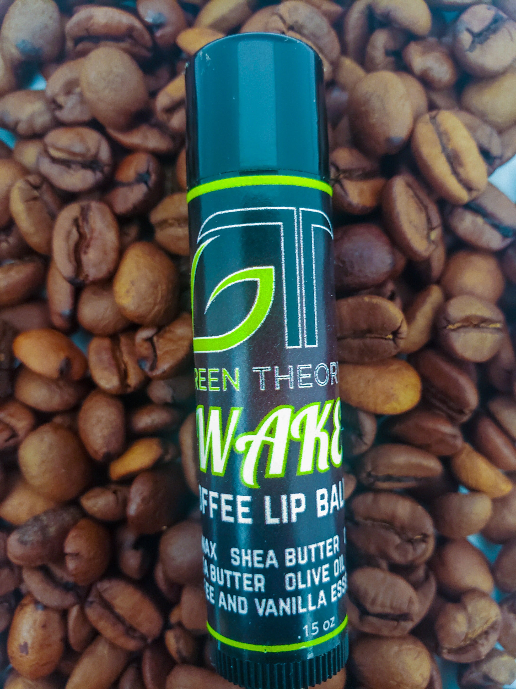 Wake All Natural Coffee and Vanilla Lip Balm in a sleek tube, showcasing its natural ingredients and inviting aroma.