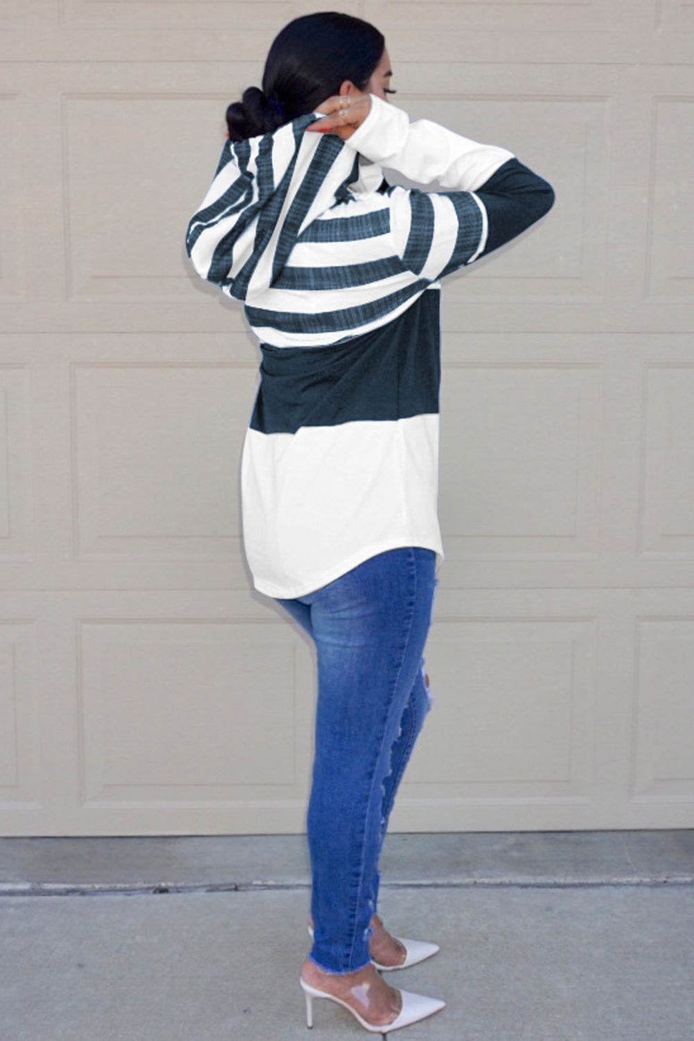 A stylish white color block drawstring hoodie featuring a classic pullover design with striped prints, perfect for casual wear.