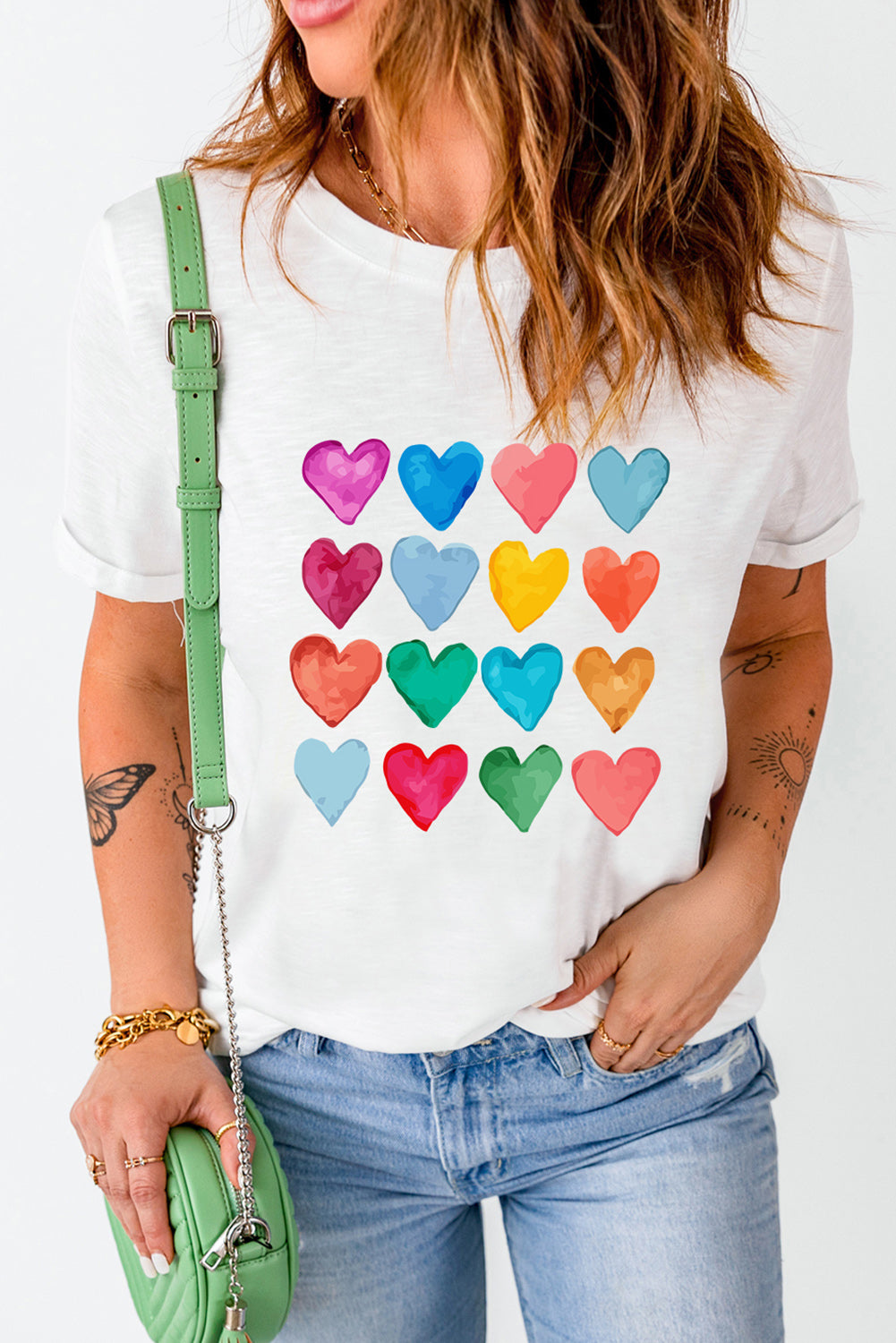 White crew neck T-shirt featuring colorful heart-shaped prints, perfect for summer and Valentine's Day.