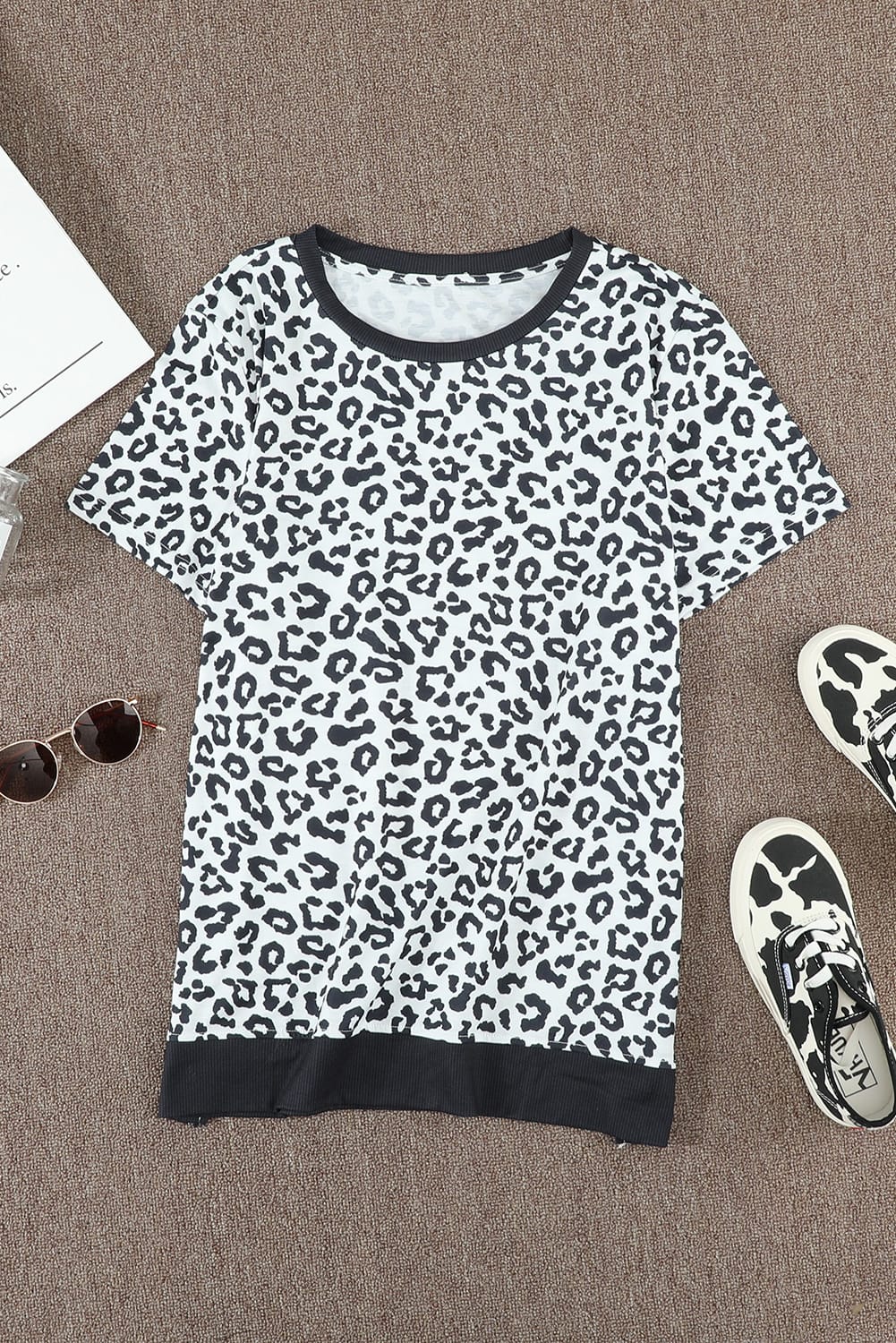 White Crew Neck T-shirt featuring a leopard print design on the sides and a stylish split, perfect for casual wear.