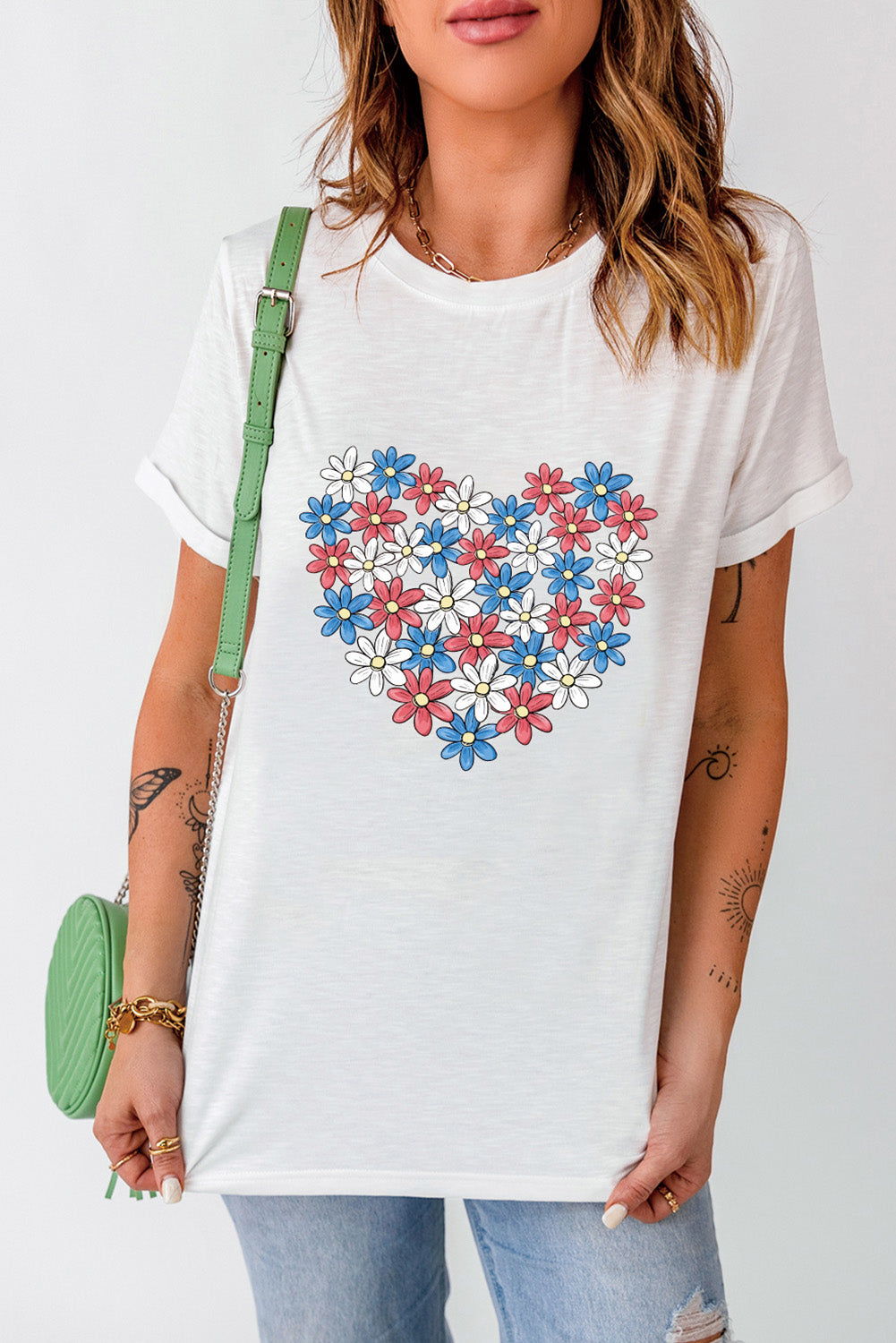 White Daisy Heart Shape Print Round Neck Casual T-Shirt displayed on a mannequin, showcasing its floral design and round neck style.