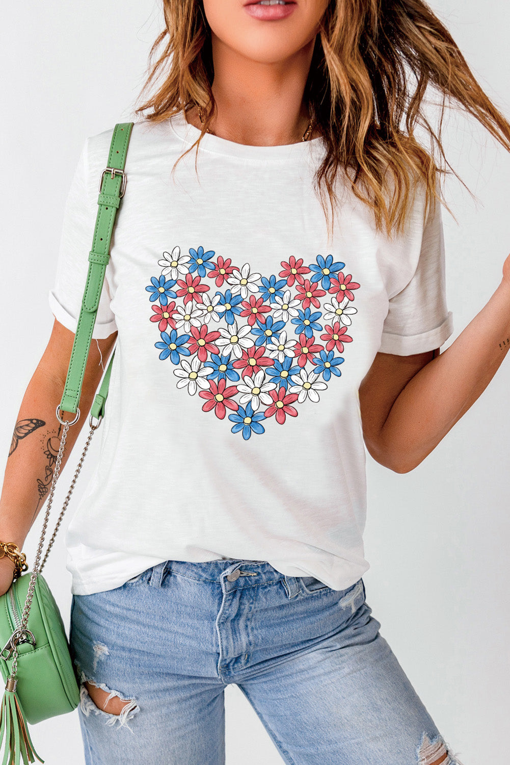 White Daisy Heart Shape Print Round Neck Casual T-Shirt displayed on a mannequin, showcasing its floral design and round neck style.