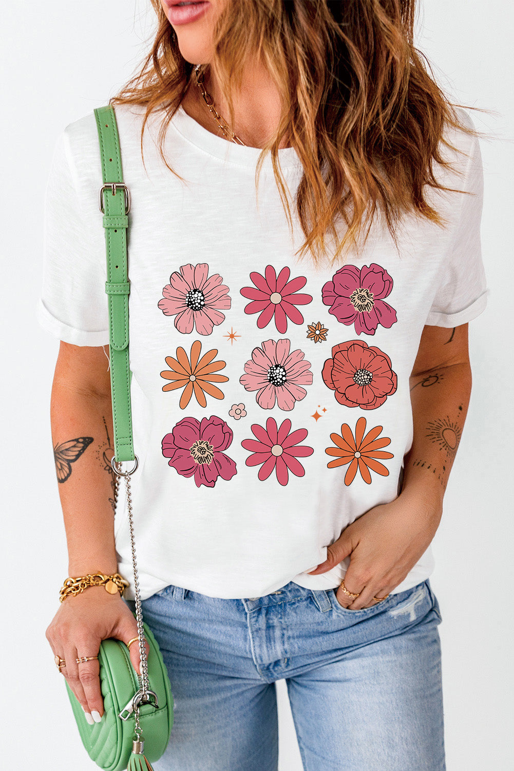 A stylish White Flower Graphic Crewneck T Shirt featuring a delicate floral design, perfect for casual wear.