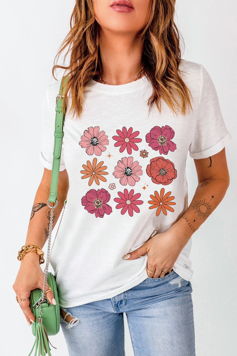 A stylish White Flower Graphic Crewneck T Shirt featuring a delicate floral design, perfect for casual wear.