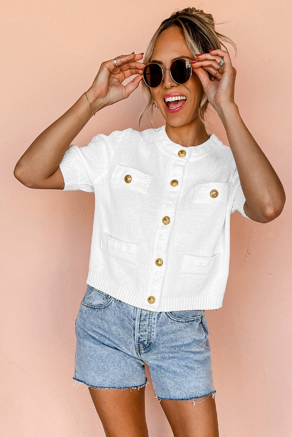 A stylish white gold buttons textured sweater t-shirt, showcasing elegant button details and soft fabric.