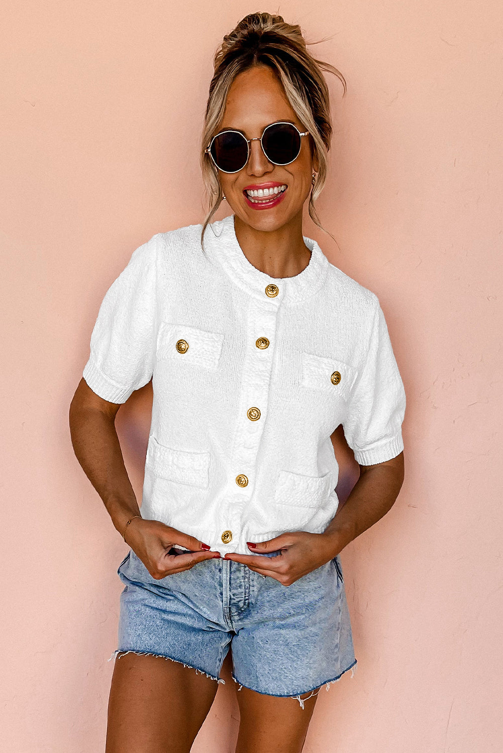 A stylish white gold buttons textured sweater t-shirt, showcasing elegant button details and soft fabric.