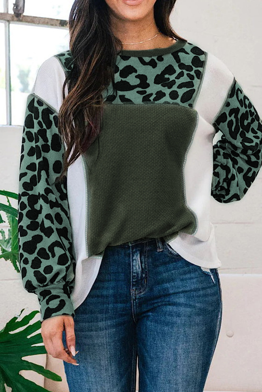 White Leopard Colorblock Patchwork Knit Top featuring a stylish design with leopard print and a relaxed fit, perfect for casual outings.