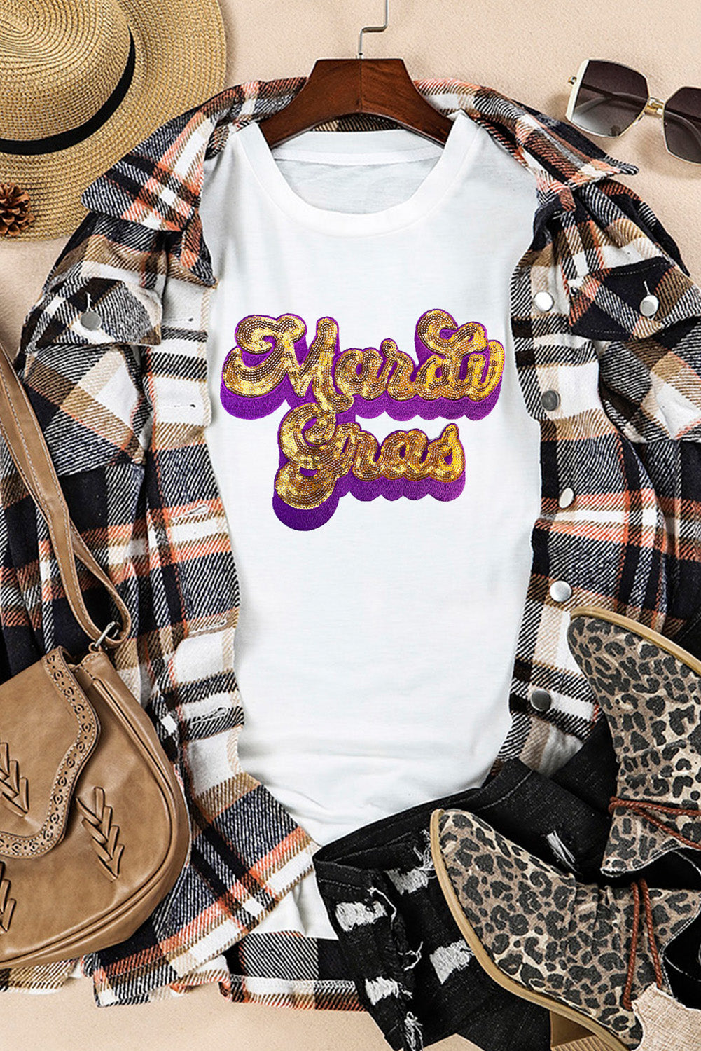 White Mardi Gras Sequin Graphic T-shirt featuring a bold design with shiny sequins, perfect for festive celebrations.