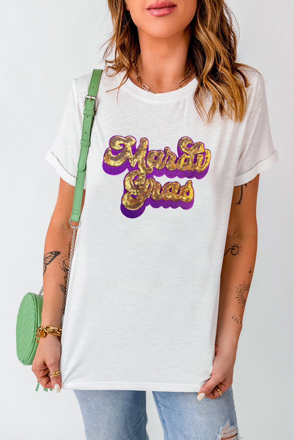 White Mardi Gras Sequin Graphic T-shirt featuring a bold design with shiny sequins, perfect for festive celebrations.