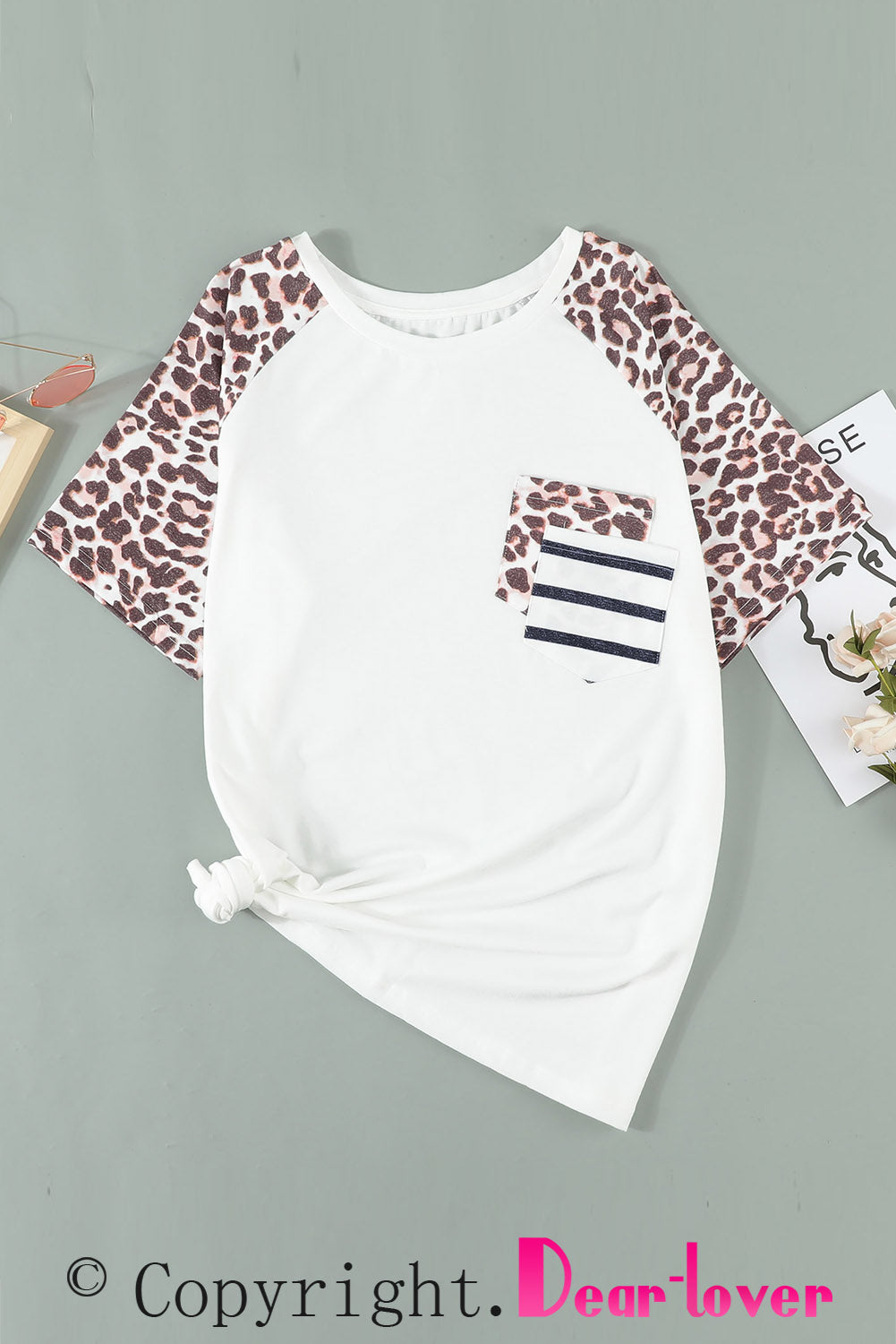 White plus size double pocket top featuring a chic leopard print and color block design, perfect for casual wear.