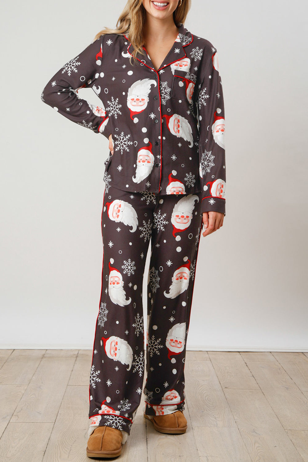 White Christmas pajama set featuring Santa Claus print on shirt and pants, perfect for holiday celebrations.