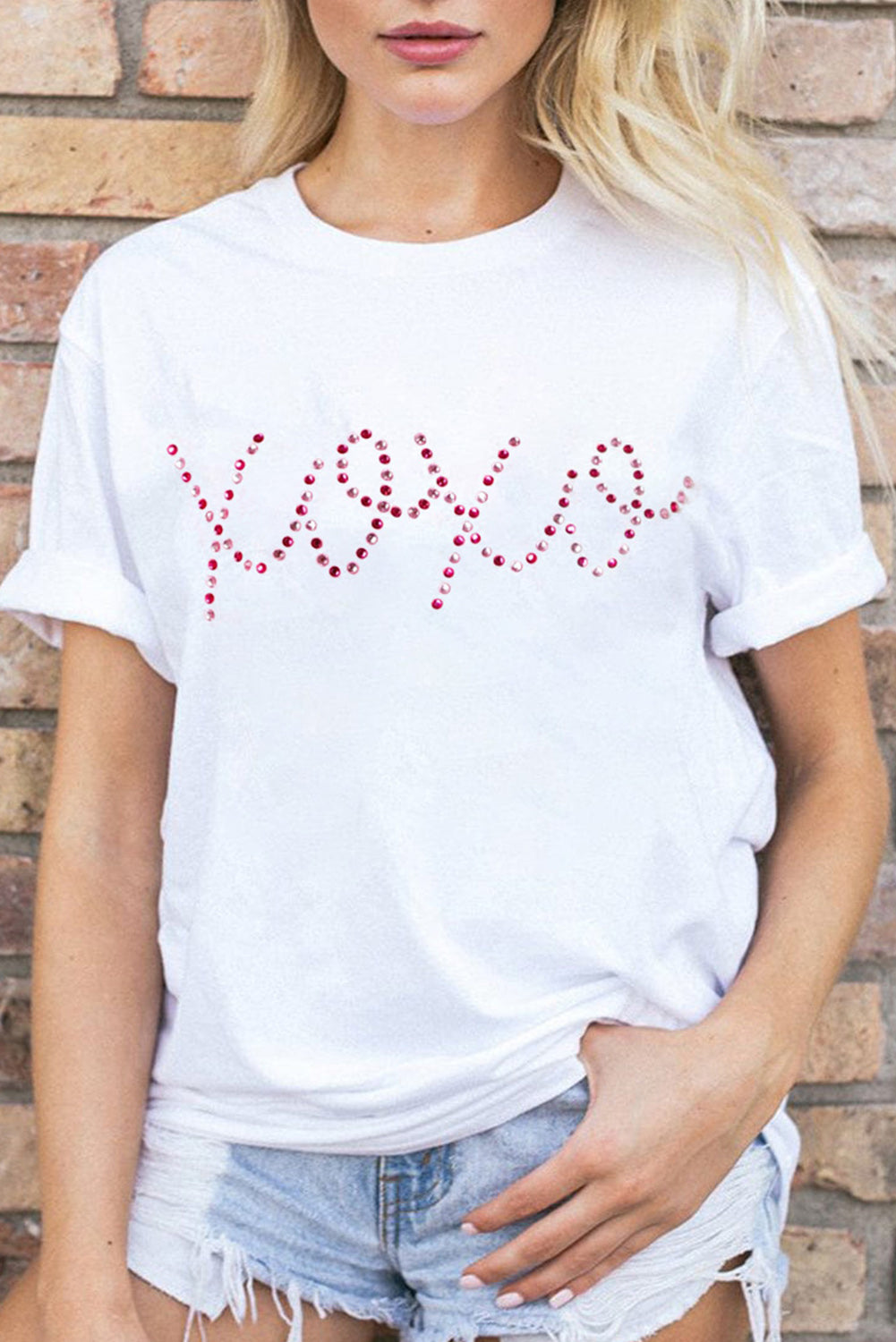 White Rhinestone XOXO Valentine Tee featuring sparkling rhinestones spelling XOXO, perfect for Valentine's Day.