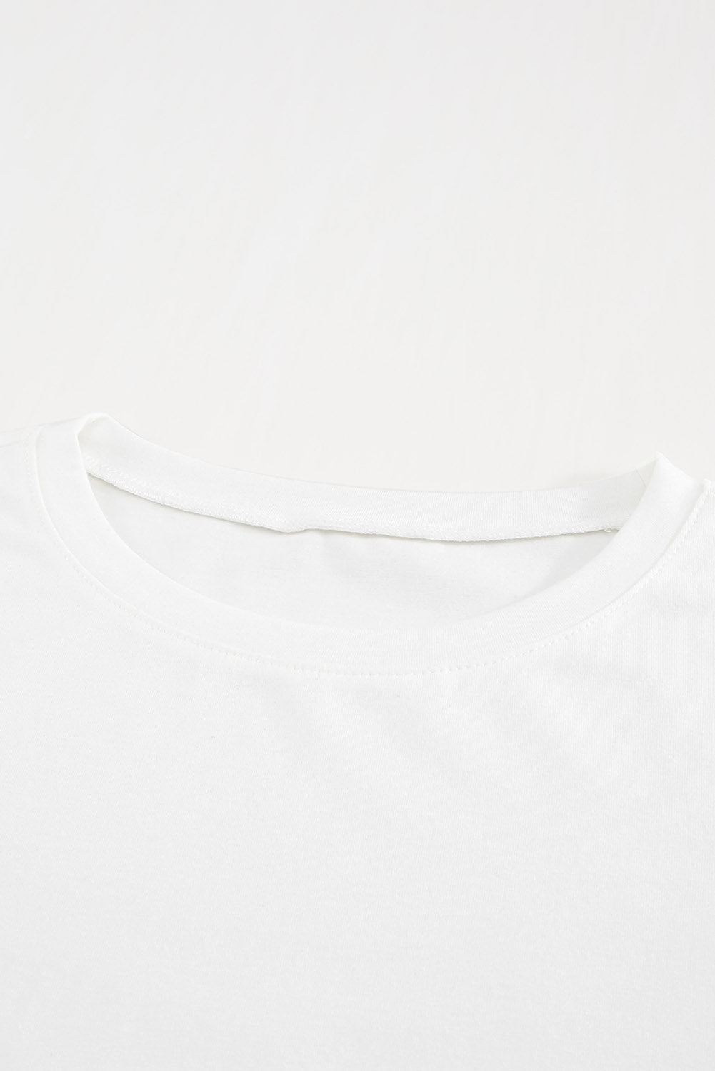 A stylish white short sleeve t-shirt featuring ruffled sleeves, perfect for casual wear.