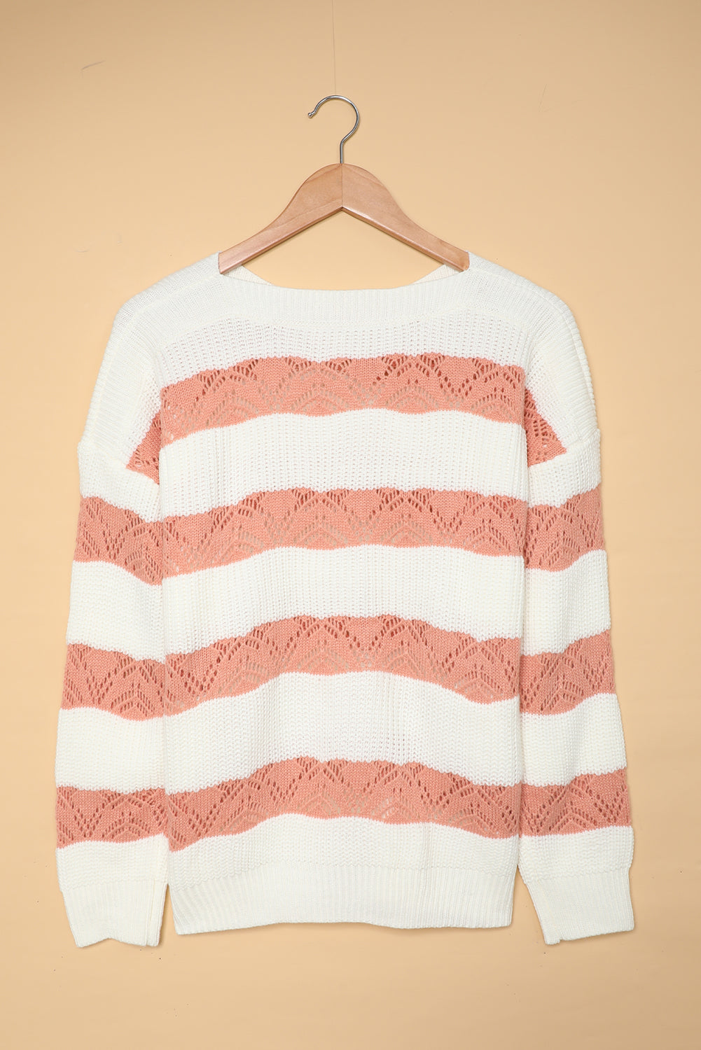 A stylish White Striped Colorblock Knit Sweater featuring a modern design with soft fabric, perfect for casual wear.