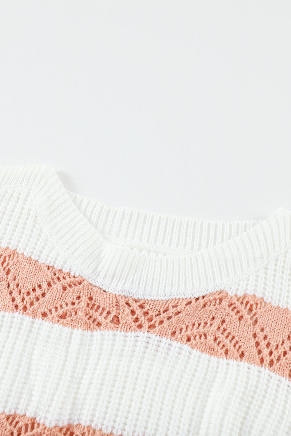 A stylish White Striped Colorblock Knit Sweater featuring a modern design with soft fabric, perfect for casual wear.