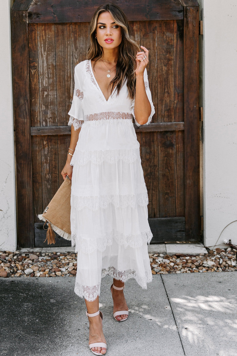 A beautiful White Swiss Dot Print See-through Lace Patch Layered Long Dress displayed elegantly, showcasing its delicate lace details and flowing silhouette.