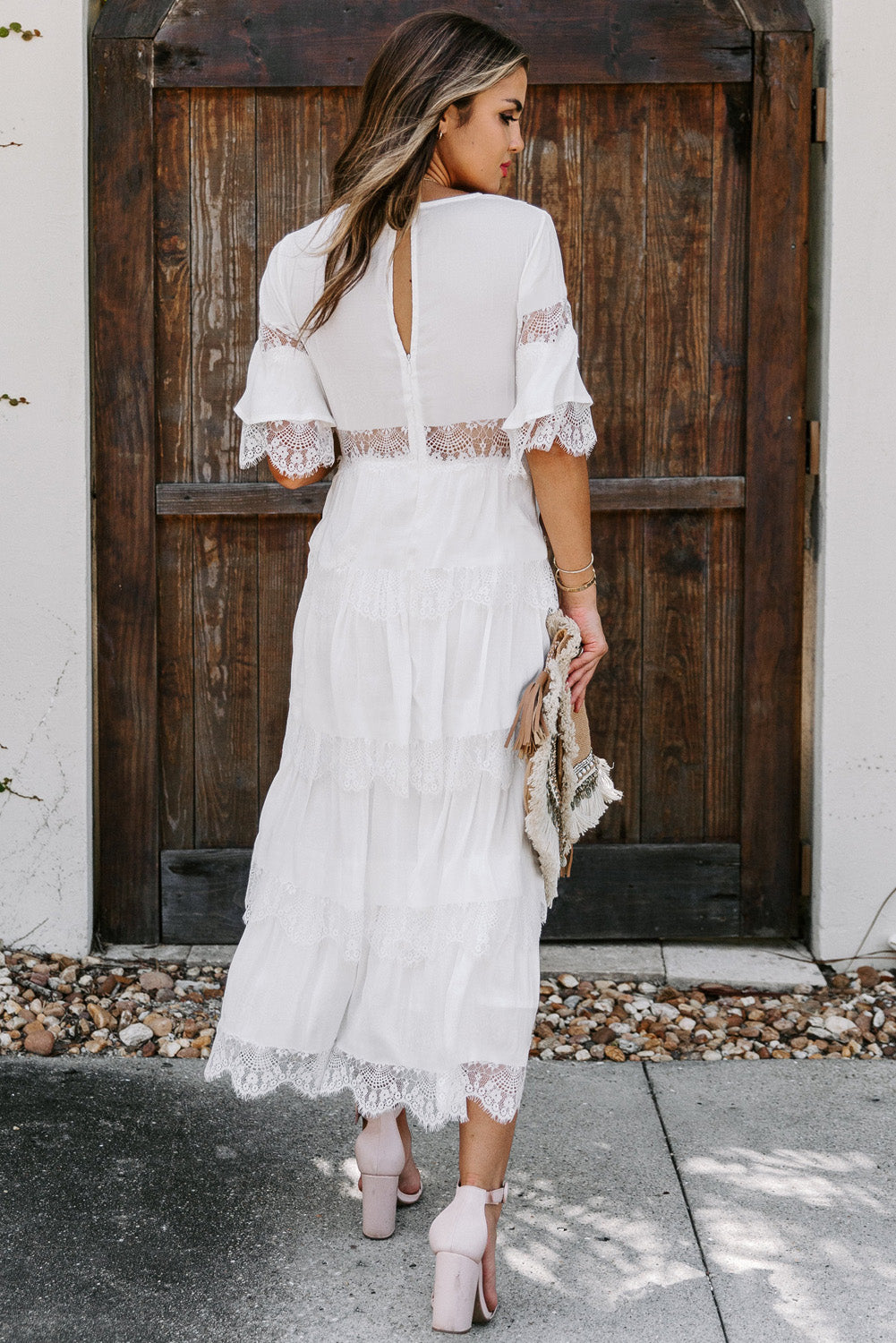 A beautiful White Swiss Dot Print See-through Lace Patch Layered Long Dress displayed elegantly, showcasing its delicate lace details and flowing silhouette.