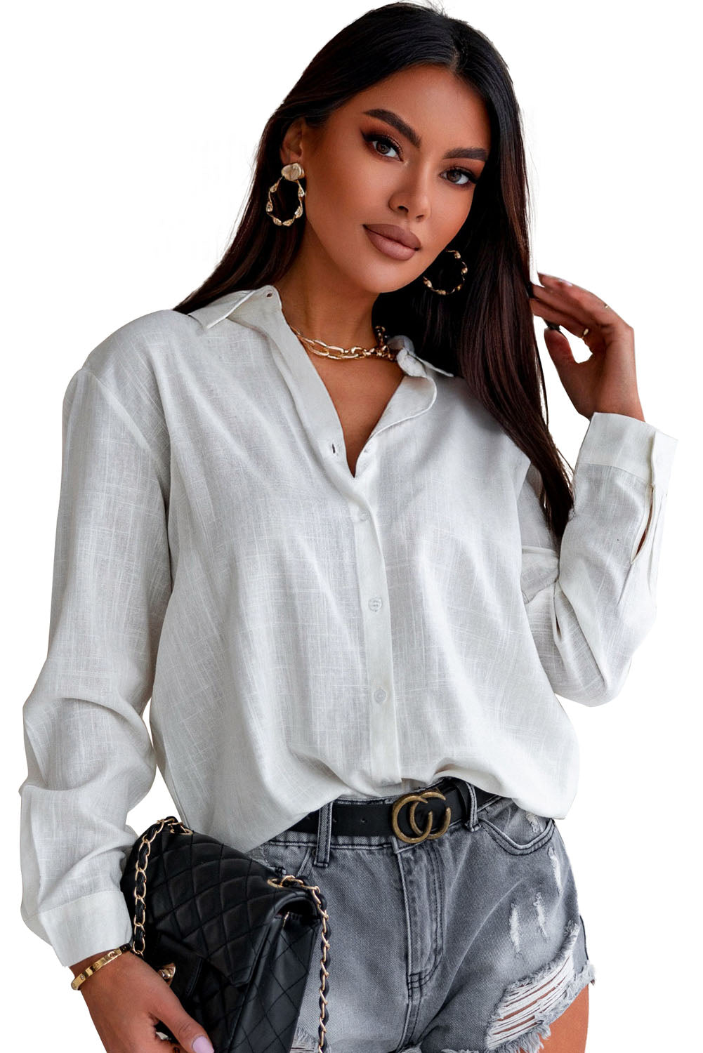 A stylish white textured solid color basic shirt featuring a button closure and collar, showcasing its elegant design and lightweight fabric.