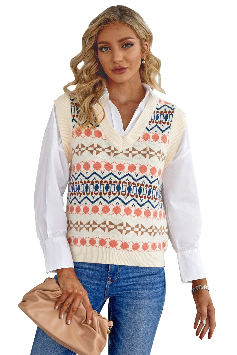 A stylish white knitted sweater vest featuring a unique tribal print design, perfect for layering during colder months.