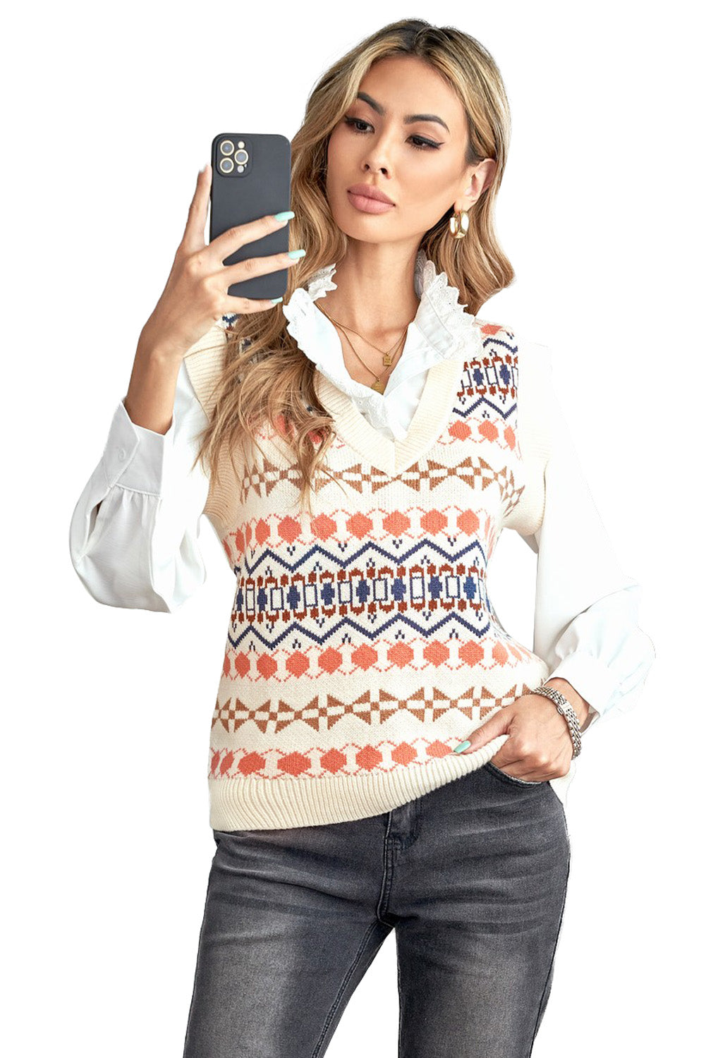 A stylish white knitted sweater vest featuring a unique tribal print design, perfect for layering during colder months.