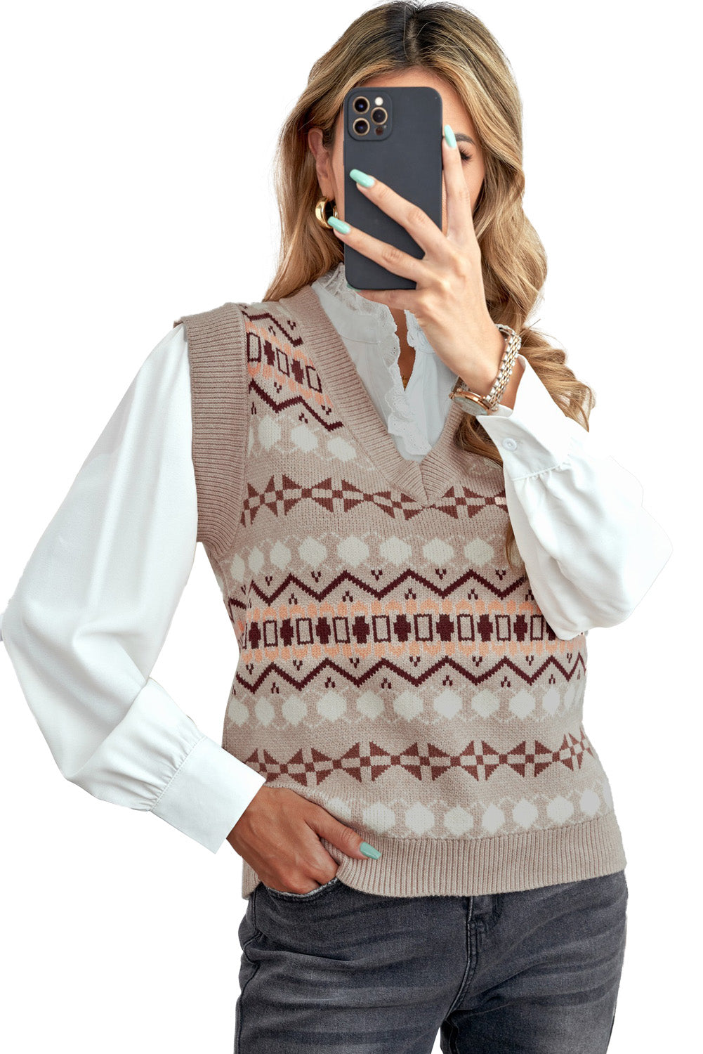 A stylish white knitted sweater vest featuring a unique tribal print design, perfect for layering during colder months.