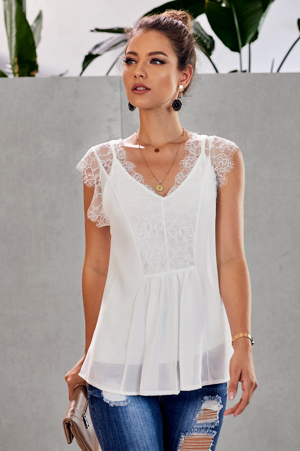 White From A Dream Lace Tank Top featuring lace accents on shoulders and neckline, adjustable racerback design, and pleated front.