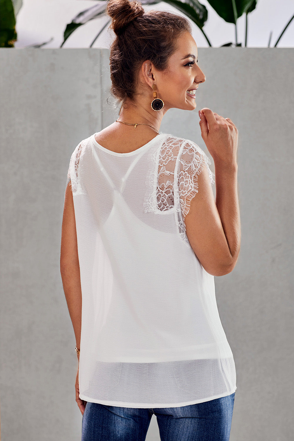 White From A Dream Lace Tank Top featuring lace accents on shoulders and neckline, adjustable racerback design, and pleated front.