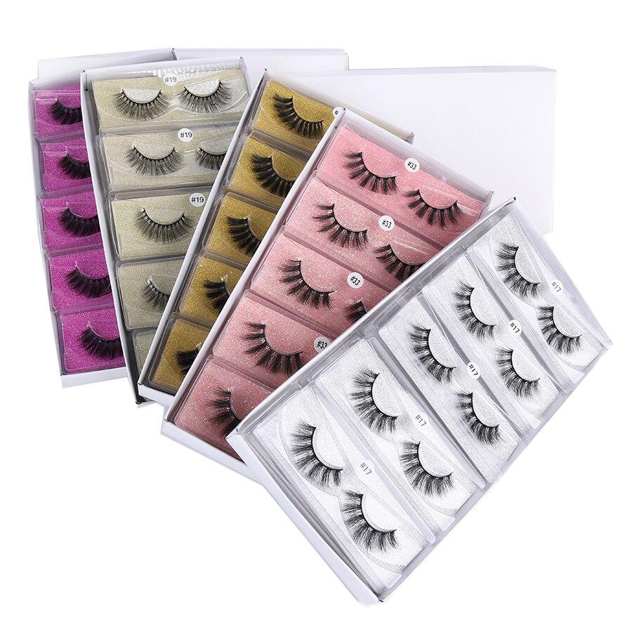 Wholesale 3D mink lashes in various lengths, showcasing natural look and quality craftsmanship with a black cotton band.