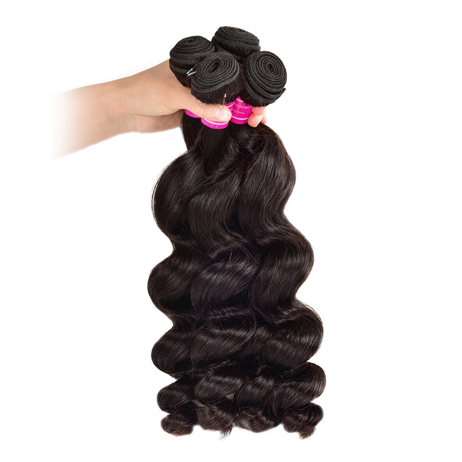 Wholesale Brazilian Loose Wave hair bundles in various lengths, showcasing the natural texture and quality of 10A Grade human hair.