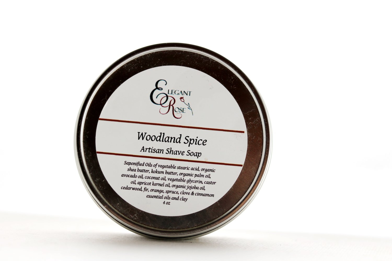 Woodland Spice Artisan Shave Soap in a tin, showcasing its creamy texture and natural ingredients, with a woodsy spice scent profile.