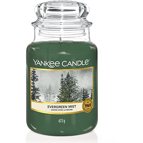 Yankee Candle Evergreen Mist Candle in a large jar, showcasing its elegant design and vibrant green color.