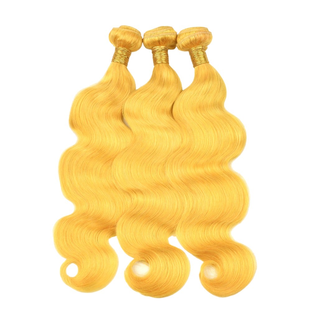 Vibrant yellow body wave hair bundles with closures, showcasing high-quality 10A grade human hair.