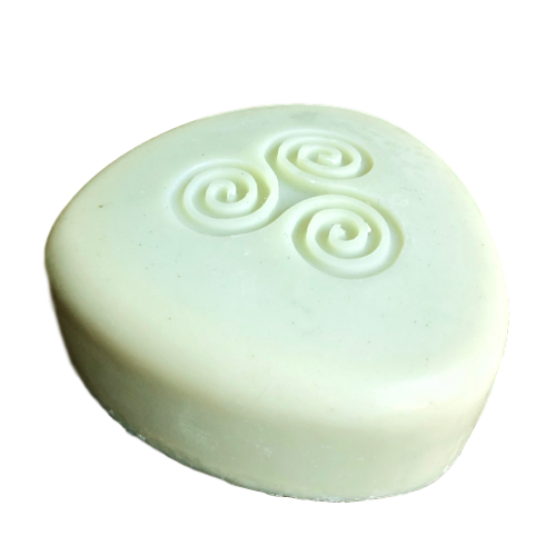 A vibrant 6oz bar of Key Lime Vacation artisan soap, showcasing its natural green and yellow hues, inspired by tropical Key West.