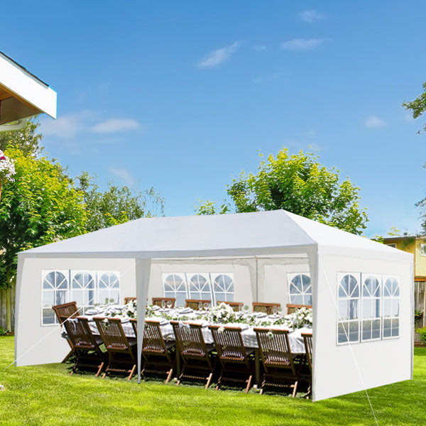 A spacious 10'X20' outdoor party tent with four removable sidewalls, showcasing its waterproof design and ample space for gatherings.