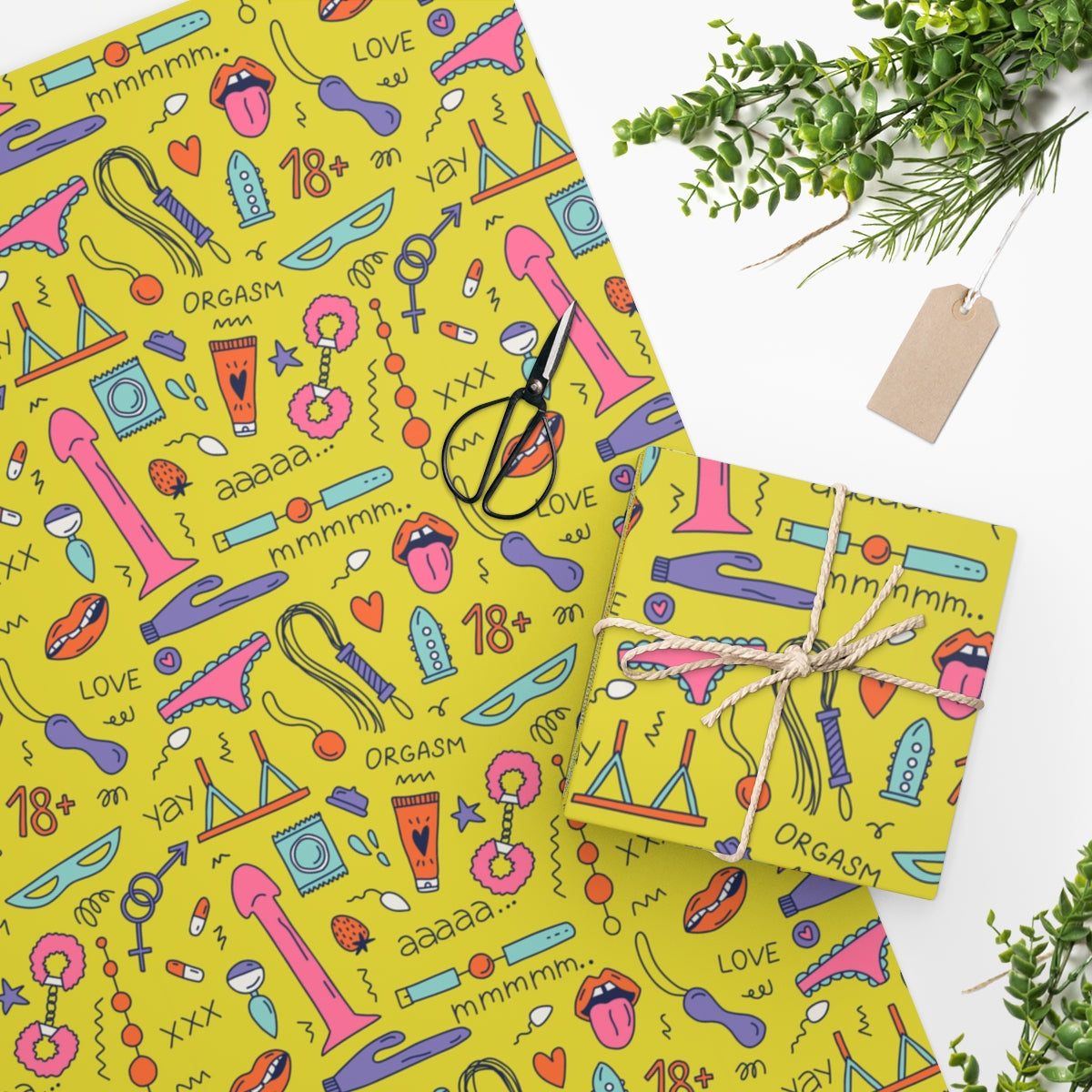 Colorful Sex Shop Wrapping Paper featuring dildos, handcuffs, and other playful designs, rolled up for easy storage.