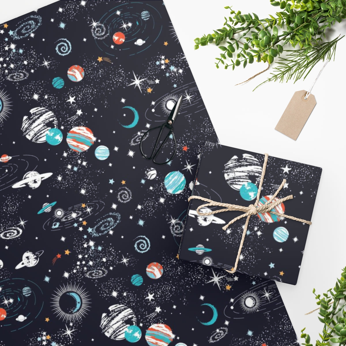 Colorful space-themed wrapping paper featuring stars and planets, rolled up for easy storage.