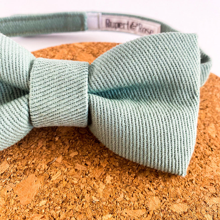 Douglas Boys Bow Tie in duckegg color, handmade with textured cotton fabric, featuring a pre-tied design and velcro fastening.