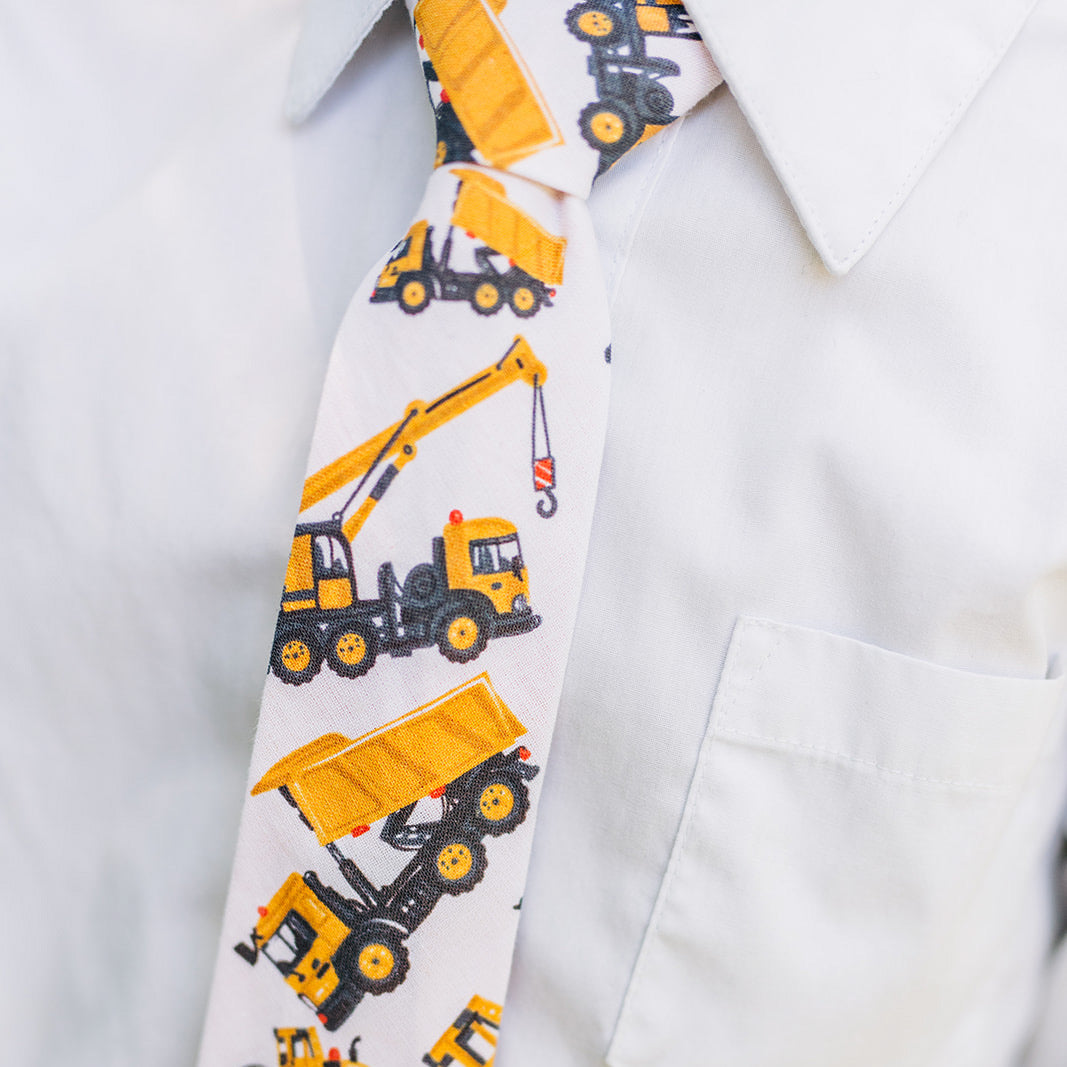 JOHN CHARLES Boys Velcro Tie featuring bright yellow diggers and cranes, perfect for young boys who love construction vehicles.