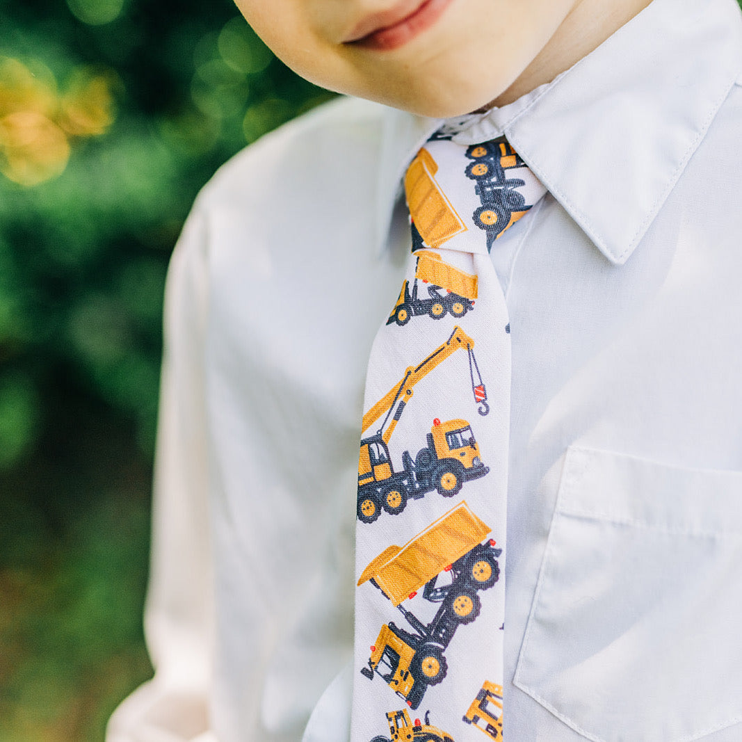 JOHN CHARLES Boys Velcro Tie featuring bright yellow diggers and cranes, perfect for young boys who love construction vehicles.