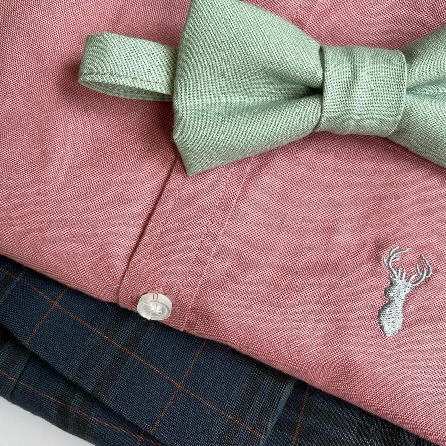 Sage green cotton boys bow tie, pre-tied with velcro fastening, perfect for weddings and special occasions.