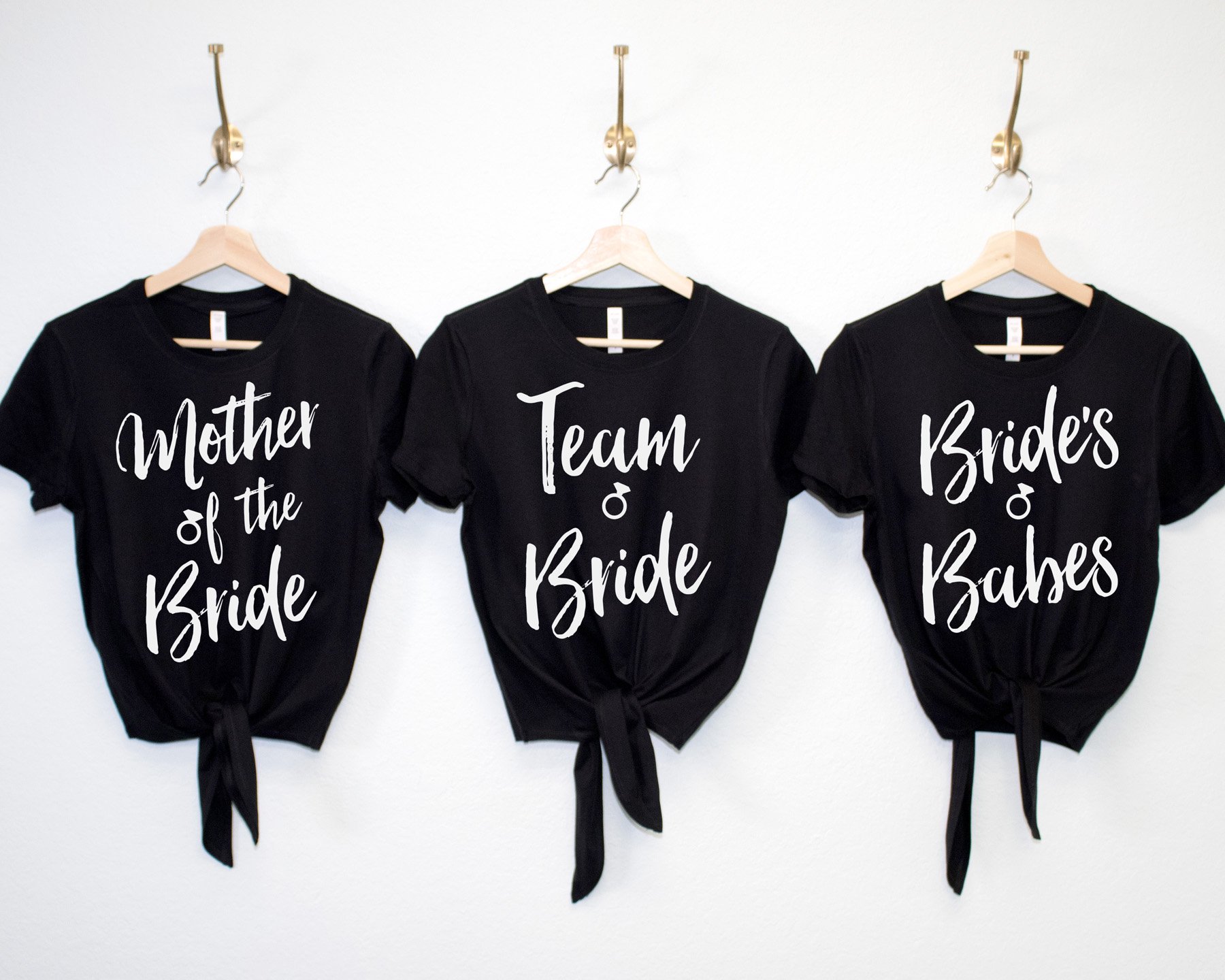 A stylish collection of Wedding Crop Top Shirts with front ties, featuring designs for brides and bridal party members in black and white.