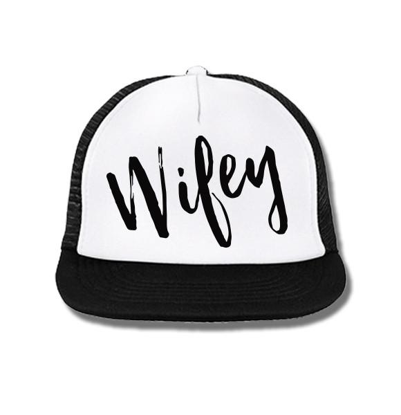 WIFEY Trucker Hat in white with black print, featuring a structured design and adjustable snapback closure.