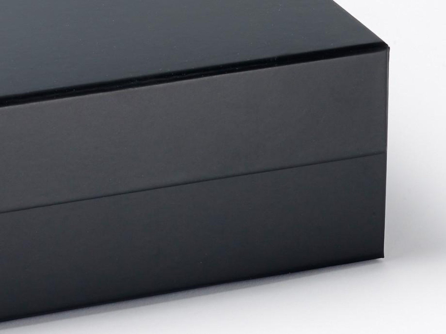 Elegant black proposal box with metallic writing, featuring a sleek design and concealed magnetic closure.