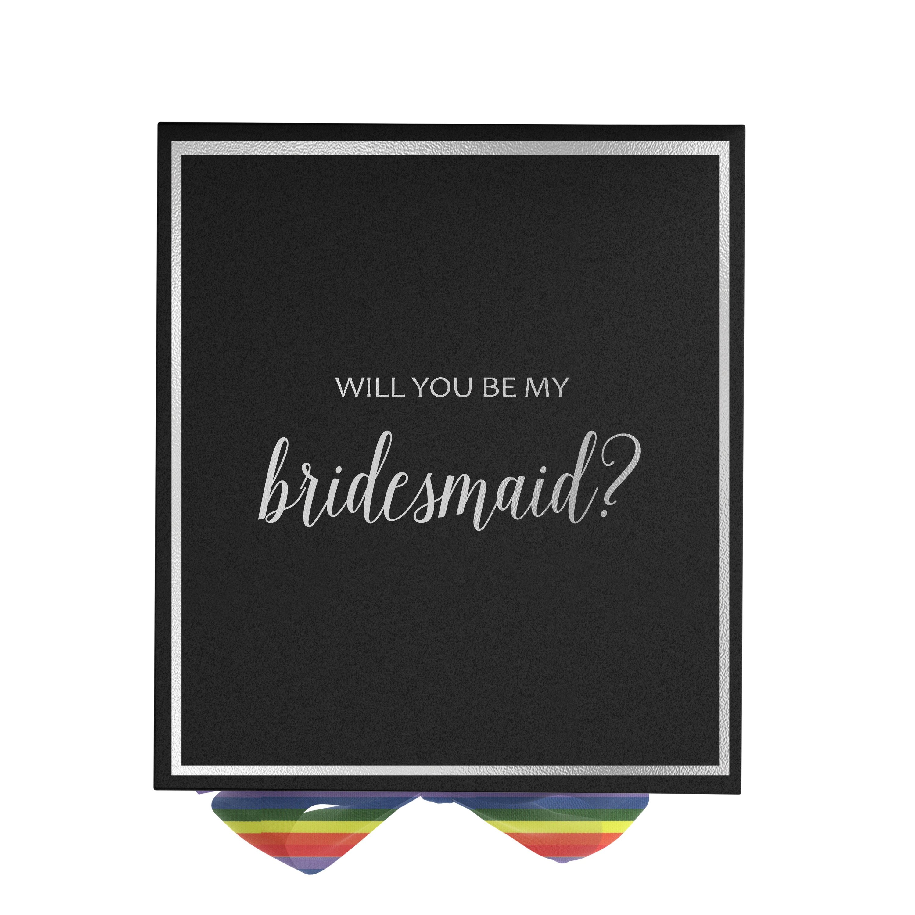 Elegant black bridesmaid proposal box with metallic writing and rainbow bow, showcasing its luxurious design.