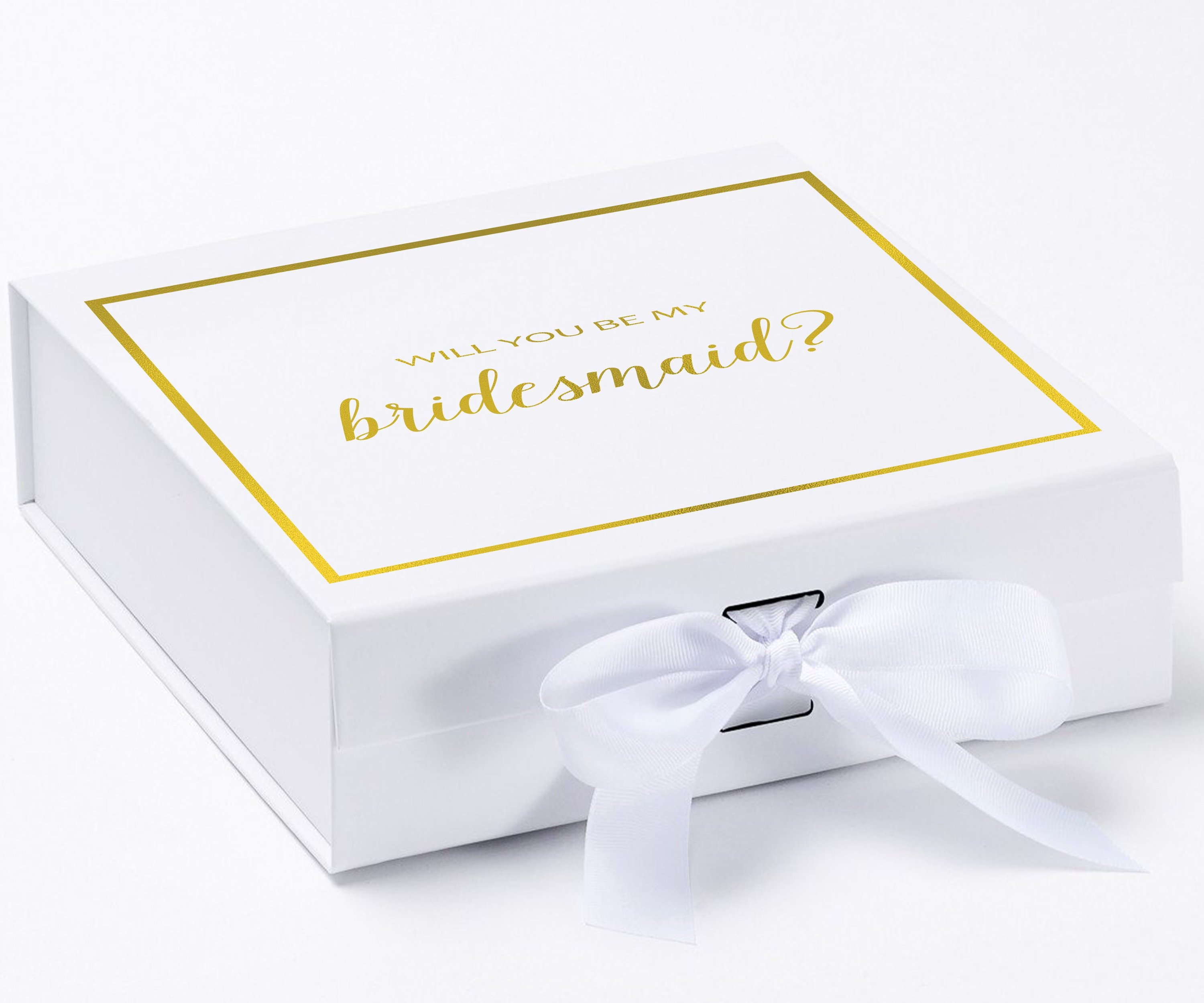 Elegant white gift box with gold metallic writing asking 'Will You Be My Bridesmaid', adorned with a black grosgrain ribbon.