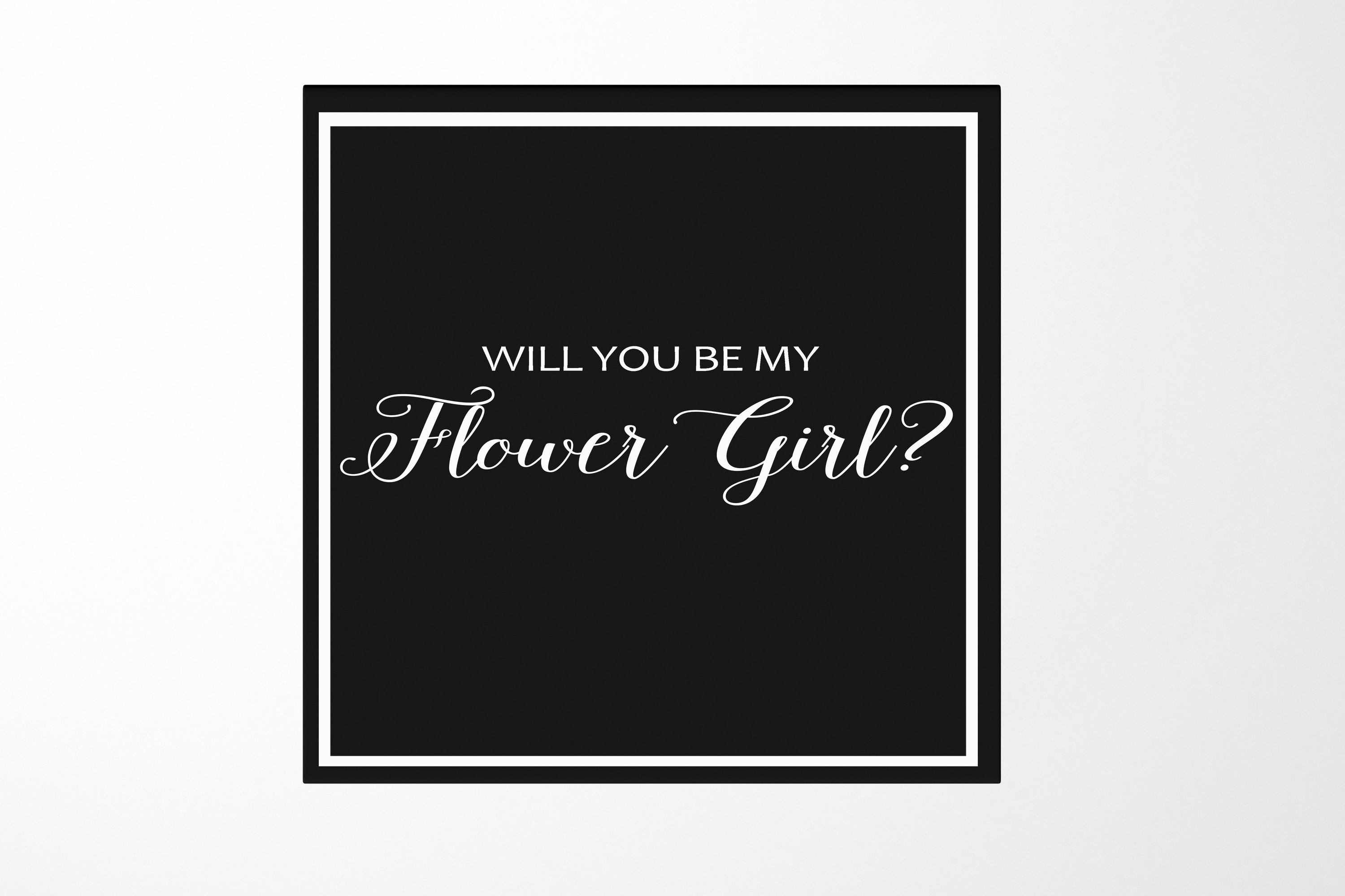 Elegant black proposal box with metallic writing, no ribbon, showcasing a sleek design for flower girl proposal.